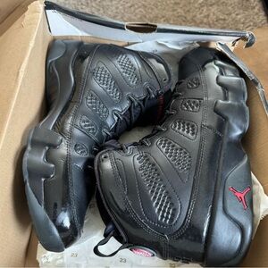 Jordan Black Athletic Shoes with Red Highlights